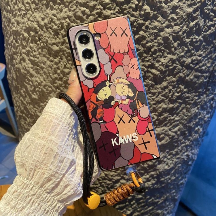 Kaws カウズgalaxy z fold5 6ブランドケースコピーハイエンドギャラクシーgalaxy z fold6 5 4 3スマホケースギャラクシーz fold6 5 4 3ブランド携帯ケースファッション ブランド